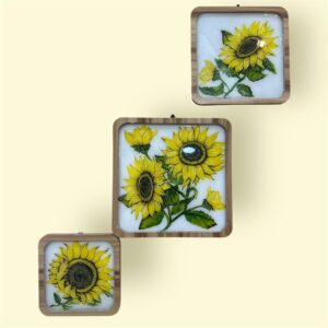 سيت كامل من الخشب مرسوم يدويا بزهرة دوار الشمس ومطلي بمادة الريزن الصلب مناسب للديكور ومعلقات الجدران